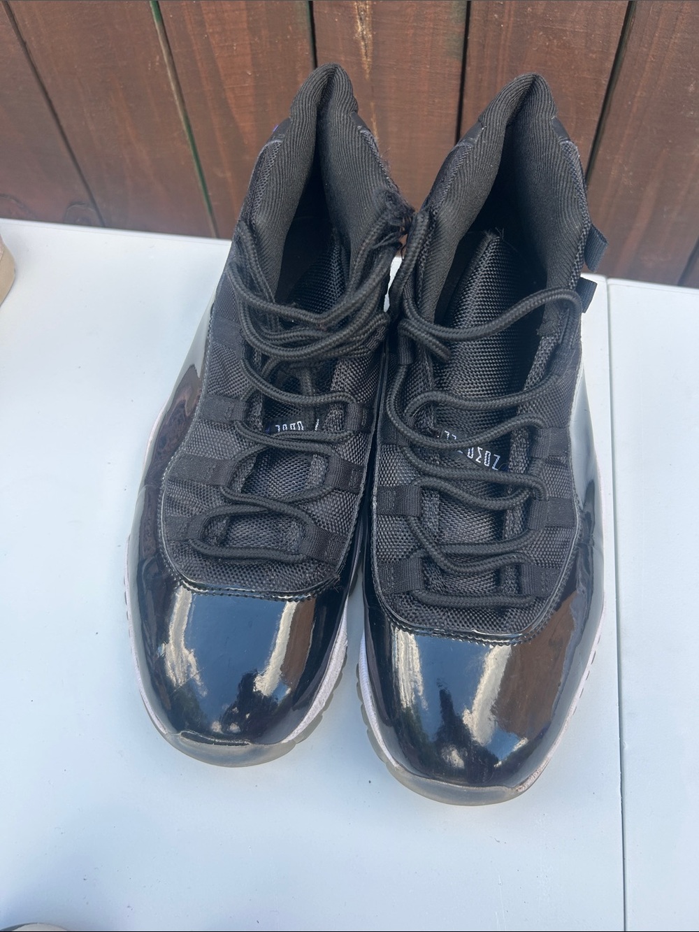 Jordan Black High-Top Patent Leather Sneakers